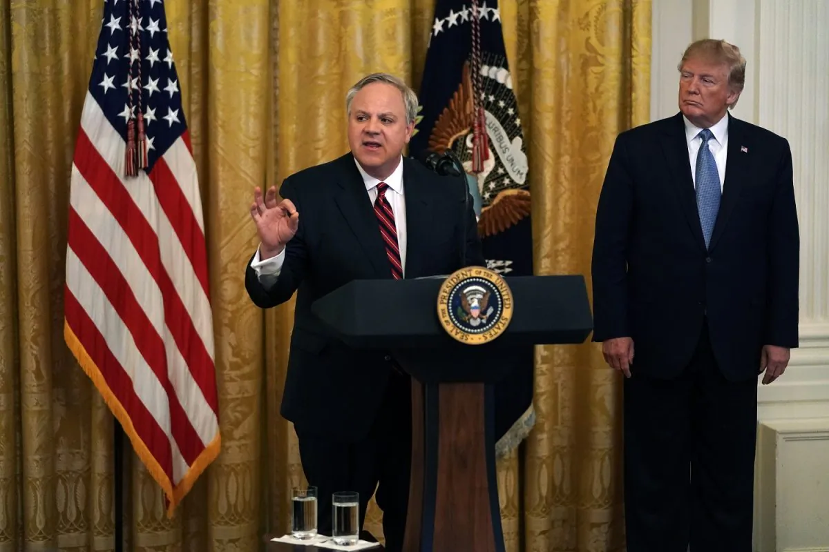 Secretary of Interior David Bernhardt (L) speaks as President Donald Trump (R) looks on during an East Room event on the environment at the White House in Washington on July 7, 2019. (Alex Wong/Getty Images)