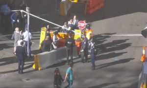 Woman Stabbed, Knife-Wielding Man Restrained by Public in Sydney