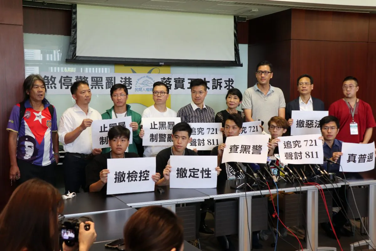 Civil Human Rights Front, the main opposition group behind the Hong Kong protests, holds a press conference in Hong Kong on Aug. 13, 2019. (Hugh Huang/The Epoch Times)