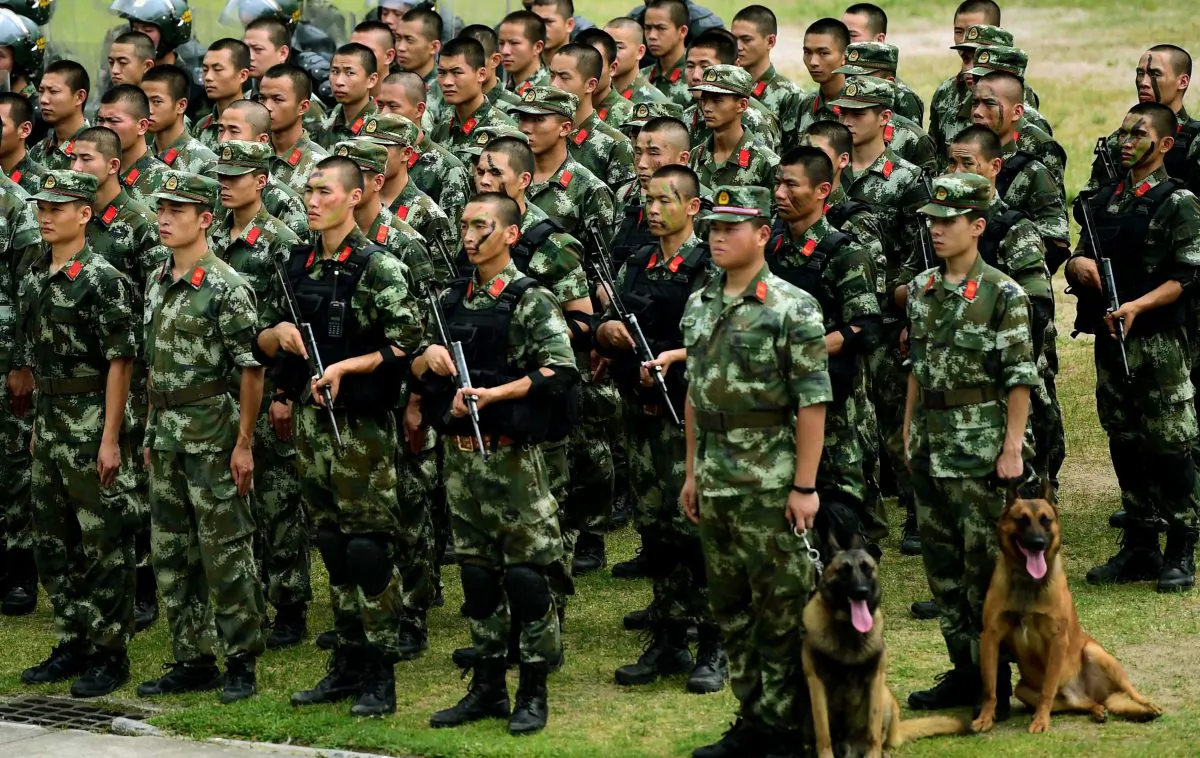 Chinese paramilitary police officers who serve on the border between Hong Kong and Guangdong province prepare to take part in anti-riot training exercises in Shenzhen of southern China's Guangdong province on June 5, 2017. (Photo credit should read STR/AFP/Getty Images)