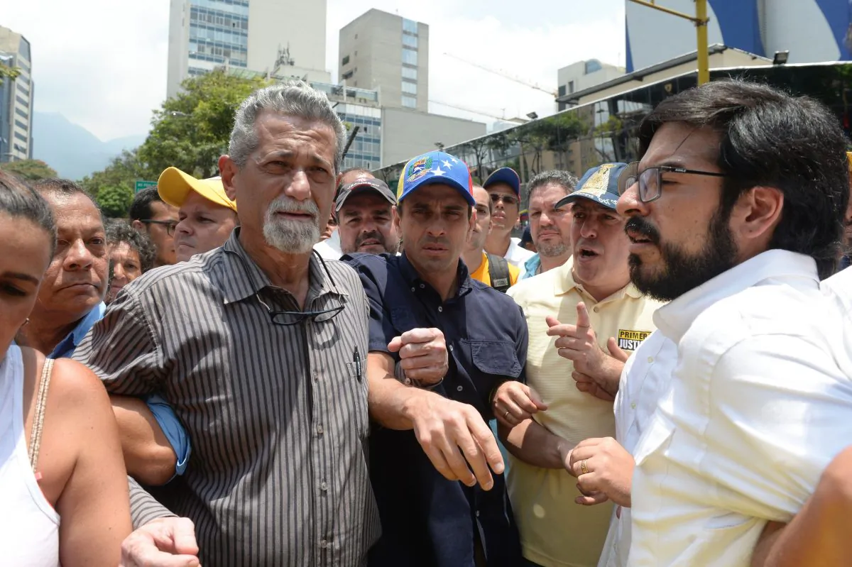Americo De Grazia (L) and other allies of Juan Guaidó participate in a mass protest against Nicolas Maduro's regime in Caracas on April 10, 2017. (Federico Parra/AFP/Getty Images)