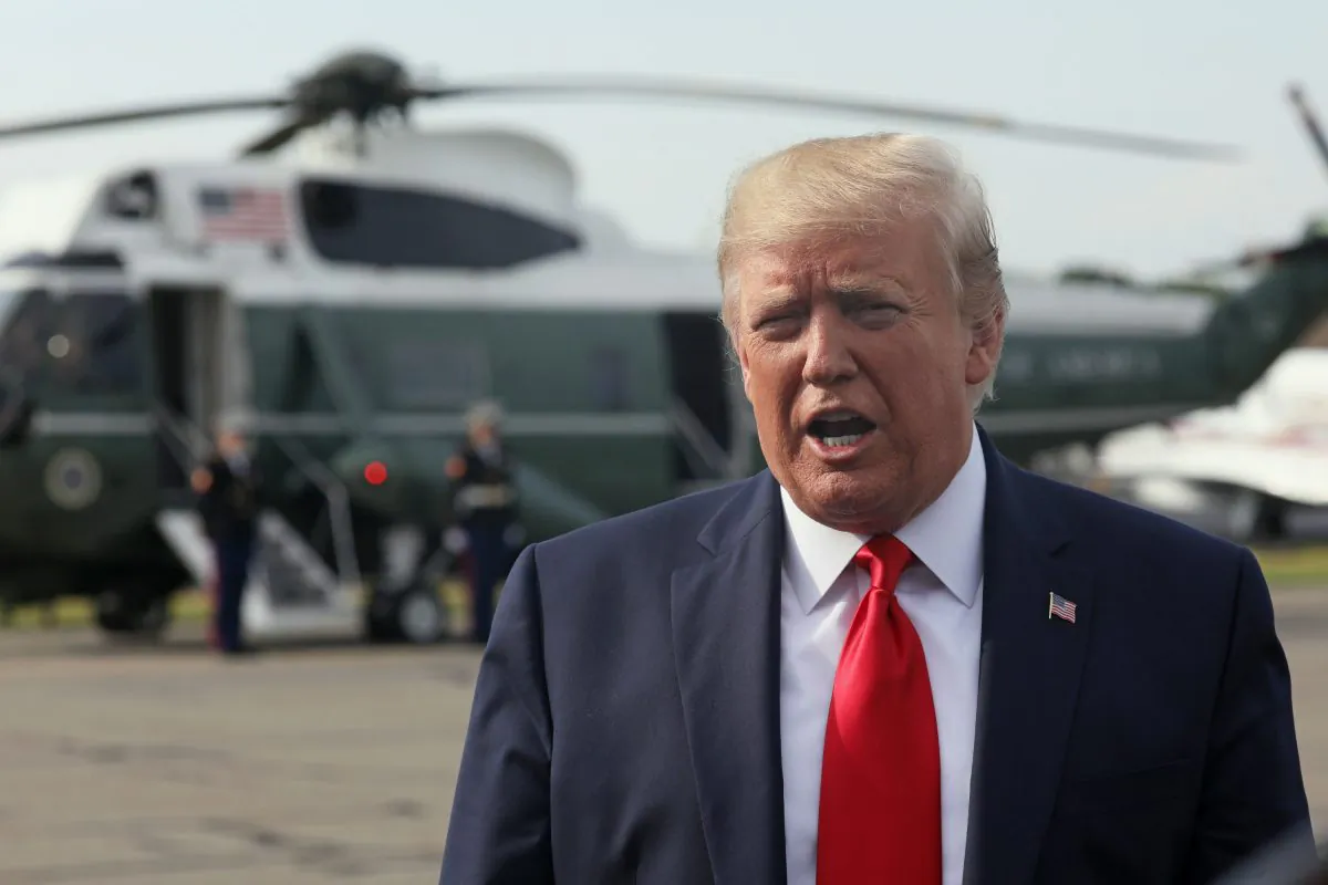 President Donald Trump speaks to reporters before boarding Air Force One at Morristown Municipal Airport in Morristown, New Jersey on Aug. 15, 2019. (Reuters/Jonathan Ernst)