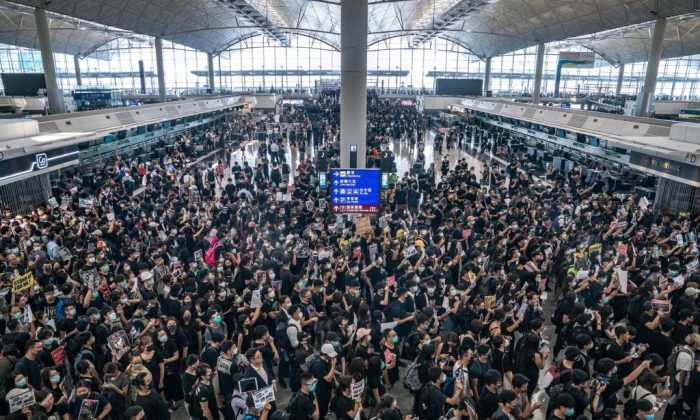 Protesters occupy the departure hall of the Hong Kong International Airport during a demonstration in Hong Kong on August 12, 2019. (Anthony Kwan/Getty Images)