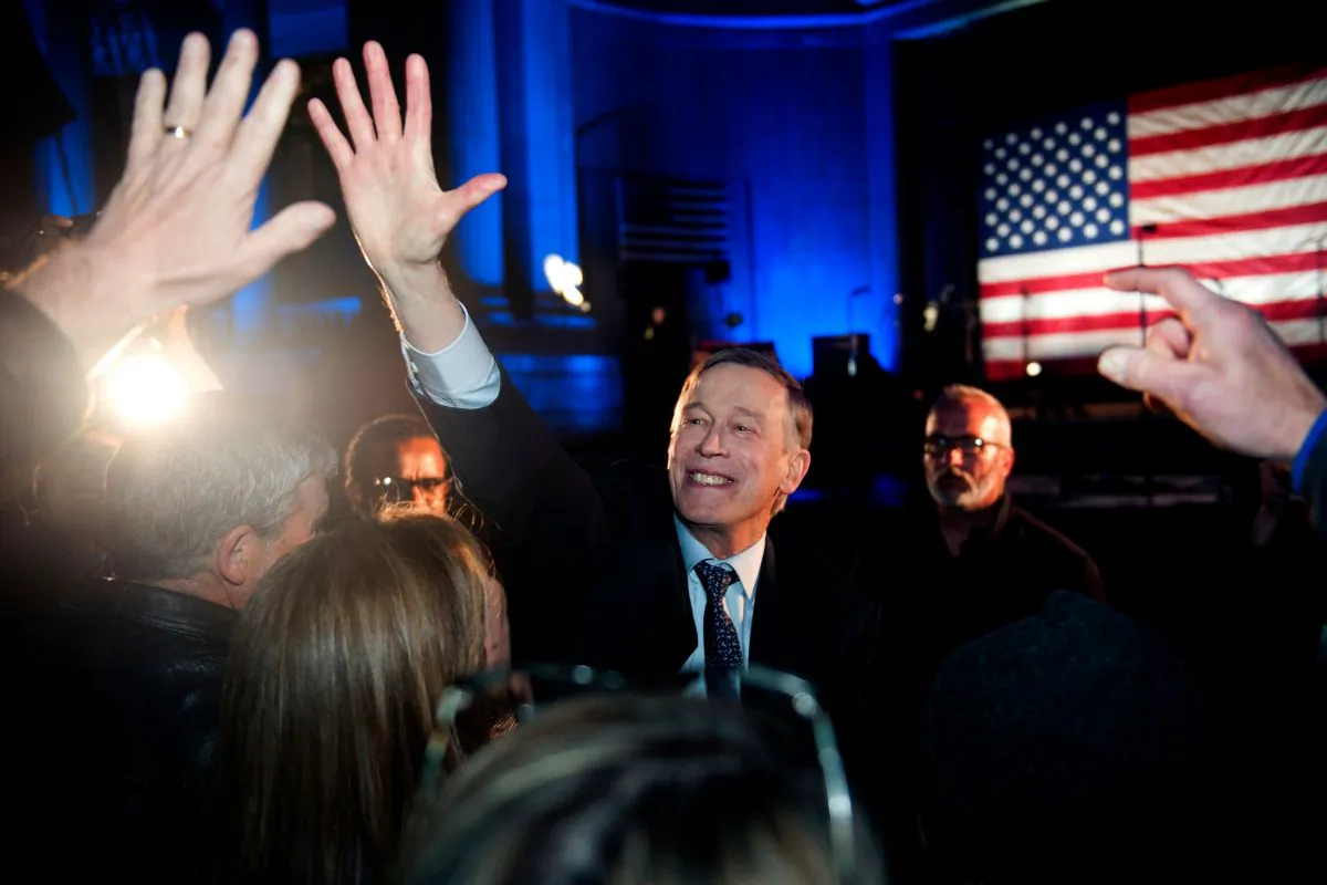 Former Colorado Governor John Hickenlooper greets supporters after his campaign kick-off rally for the 2020 US presidential race at Civic Center Park in Denver, Col. on Mar. 7, 2019. (Jason Connolly/AFP/Getty Images)