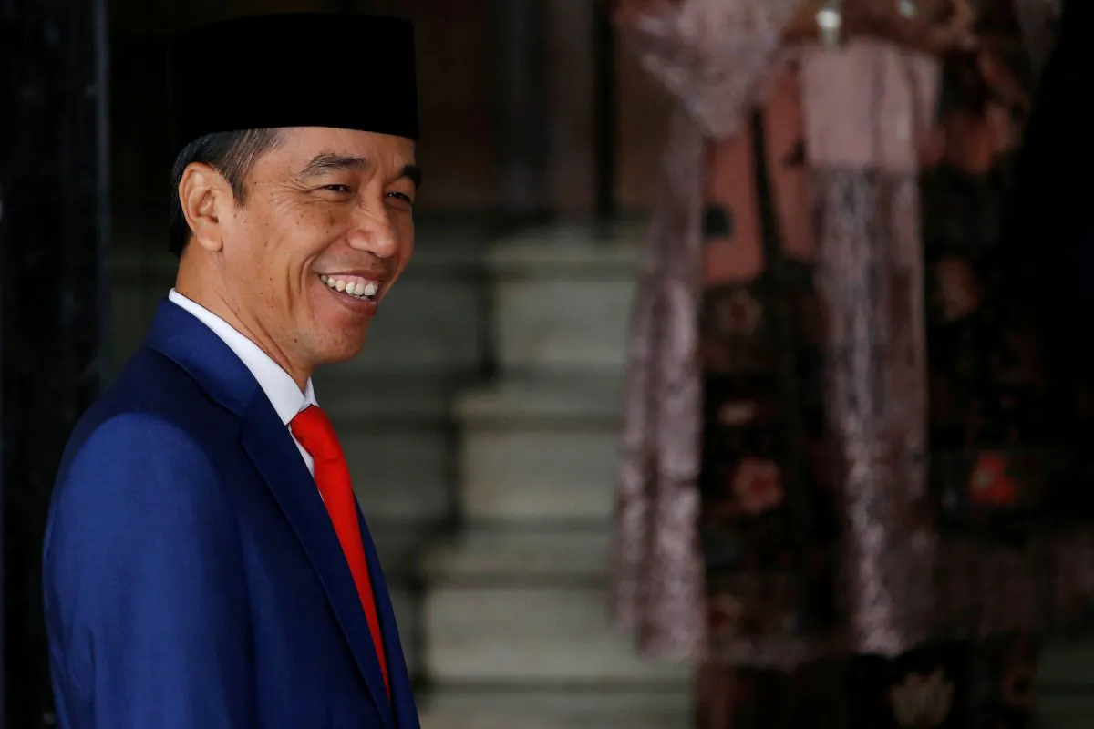 Indonesian President Joko Widodo smiles at reporters as he arrives before delivering a speech ahead of Independence Day, at the parliament building in Jakarta, Indonesia, on Aug. 16, 2019. (Reuters/Willy Kurniawan)