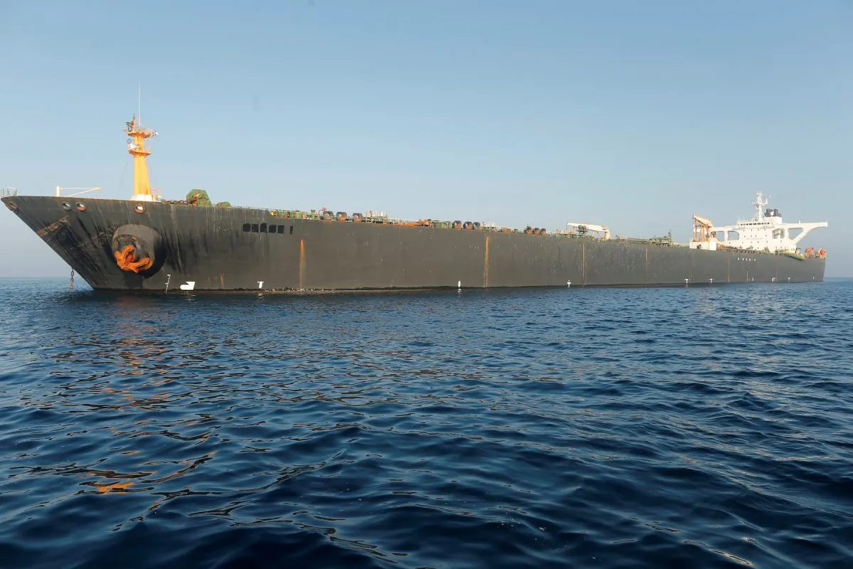 The name of Iranian oil tanker Grace 1 is seen removed as it sits anchored after the Supreme Court of the British territory lifted its detention order, in the Strait of Gibraltar, southern Spain, August 16, 2019. REUTERS/Jon Nazca