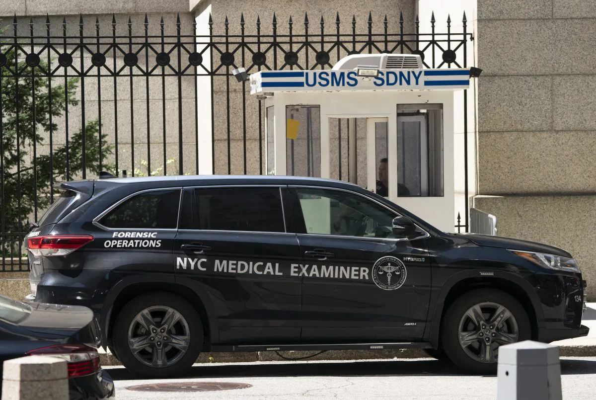 A New York Medical Examiner's car is parked outside the Metropolitan Correctional Center where financier Jeffrey Epstein was being held, on Aug. 10, 2019, in New York. (DON EMMERT/AFP/Getty Images)