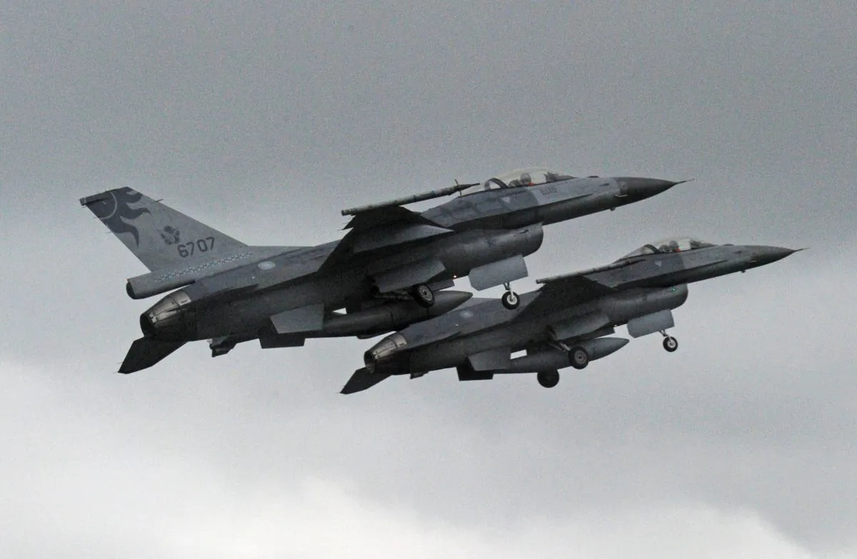 Two US-made F-16 fighters in the air during an scramble take off at the eastern Hualien air force base on Jan. 23, 2013. (Sam Yeh/AFP/Getty Images)