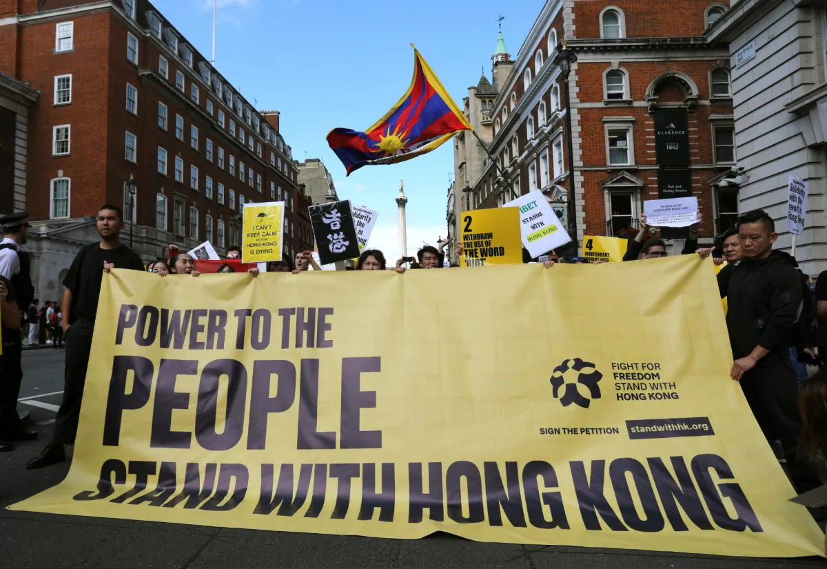 Protesters gather in central London to attend a march organized by StandwithHK and D4HK in support of pro-democracy protests in Hong Kong on Aug. 17, 2019. (Isabel Infantes/AFP/Getty Images)
