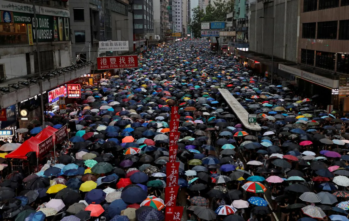 Anti-extradition bill protesters march to demand democracy and political reforms in Hong Kong, on Aug. 18, 2019. (Tyrone Siu/Reuters)
