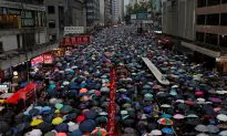 Former Hong Kong Journalist Fled Hong Kong in Fear of Arrest