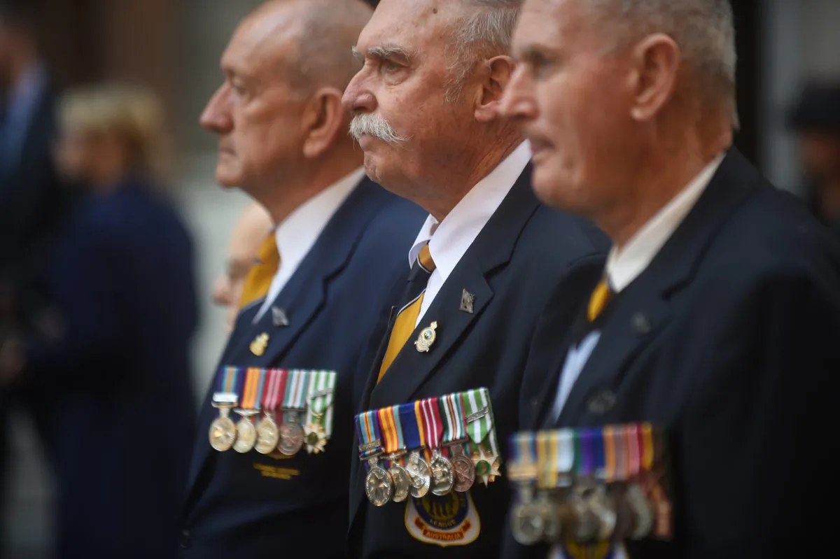 Australian war veterans wear their medals at the 50th anniversary of the Vietnam Veterans Memorial Service in Sydney on Aug. 18, 2016. (PETER PARKS/AFP/Getty Images)