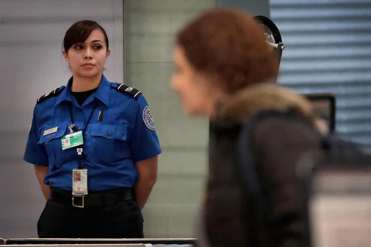 A Transportation Security Administration worker screens passengers and airport employees at O'Hare International Airport in Chicago, Ill., on Jan. 07, 2019. (Scott Olson/Getty Images)