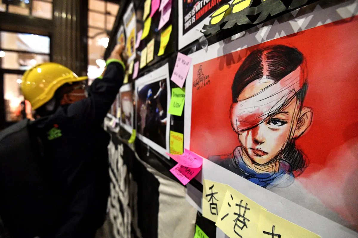Sticky-notes carrying messages of support for Hong Kong's pro-democracy protesters and an image of a woman who suffered an eye injury, which demonstrators have blamed on a bean-bag round fired by police, are displayed during a demonstration at Martin Place in Sydney on Aug. 16, 2019. (Saeed Khan/AFP/Getty Images)