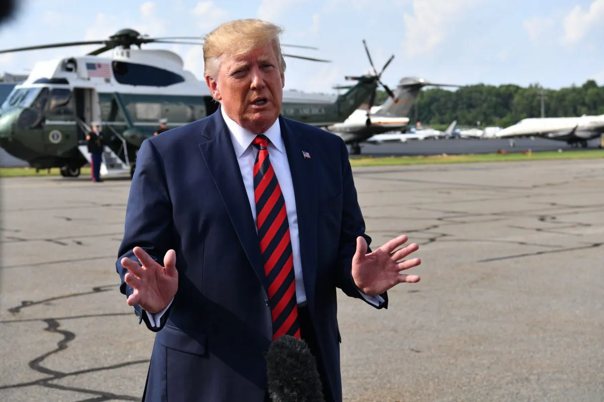 President Donald Trump speaks to reporters before boarding Marine One in Morristown, N.J., on Aug. 18, 2019. (Nicholas Kamm/AFP/Getty Images)