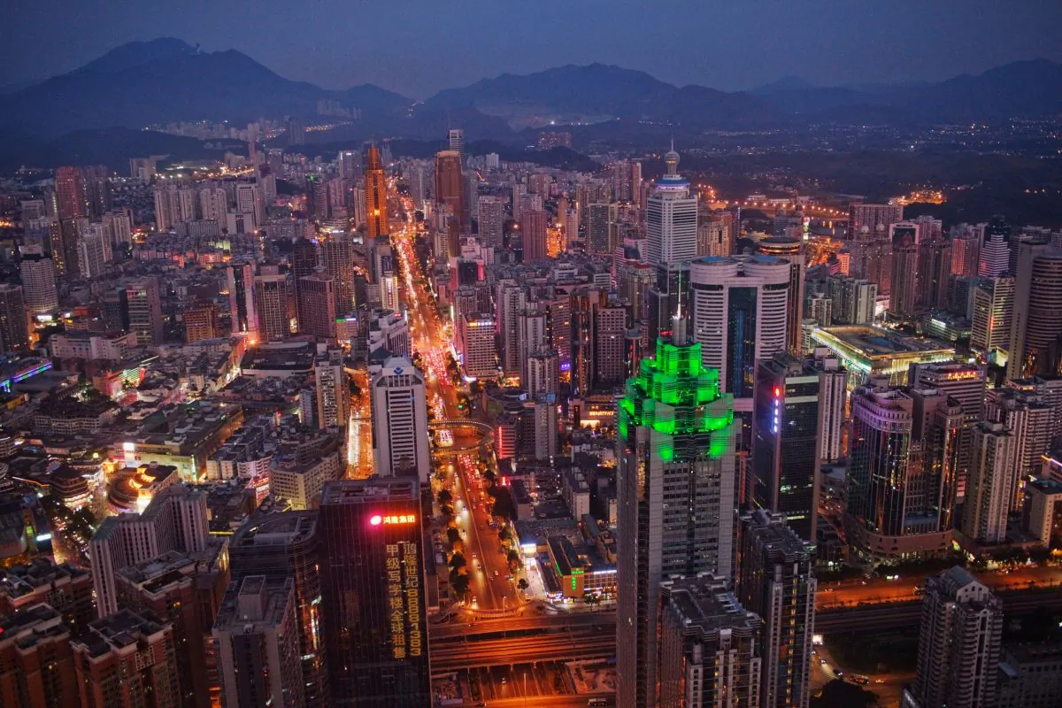 The Shenzhen skyline on Nov. 28, 2010. The building illuminated by green lights is the Shenzhen World Financial Center. (Daniel Berehulak/Getty Images)