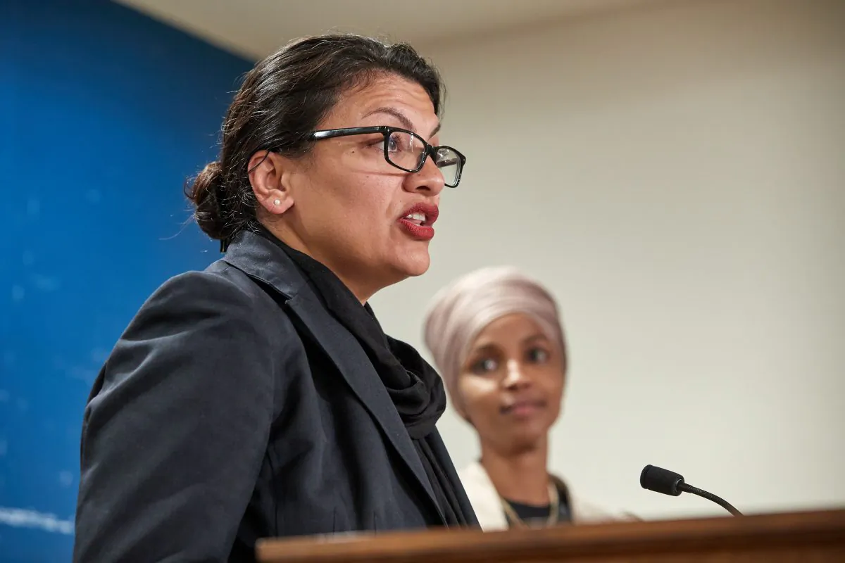 (L-R) Reps. Rashida Tlaib (D-Mich.) and Ilhan Omar (D-Minn.) hold a press conference in St. Paul, Minnesota in a Aug. 19, 2019, file photograph. (Adam Bettcher/Getty Images)