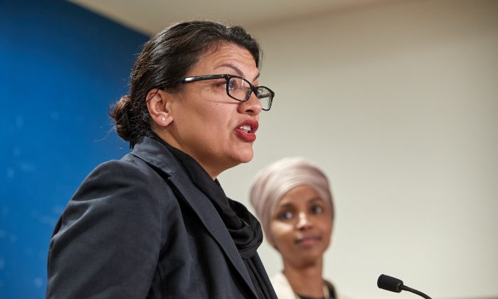 (L-R) Reps. Rashida Tlaib (D-Mich.) and Ilhan Omar (D-Minn.) hold a press conference in St. Paul, Minnesota in a Aug. 19, 2019, file photograph. (Adam Bettcher/Getty Images)