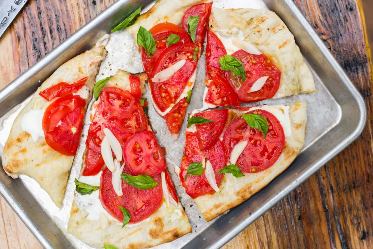 Pizza, hot off the grill. (Caroline Chambers)