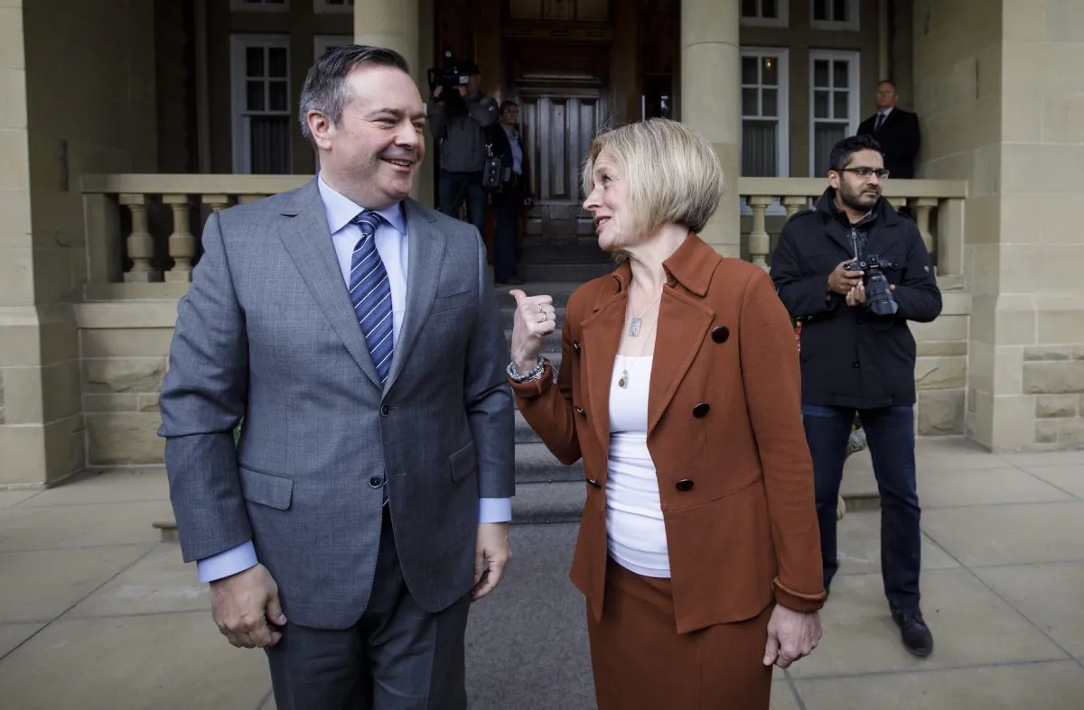 Then-Premier-Designate Jason Kenney and Then-Alberta Premier Rachel Notley meet in Edmonton on April 18, 2019. (Jason Franson/The Canadian Press)