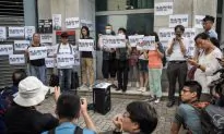 China Confirms It Has Detained Hong Kong British Consulate Staff as a Rally is Held Demanding His Release