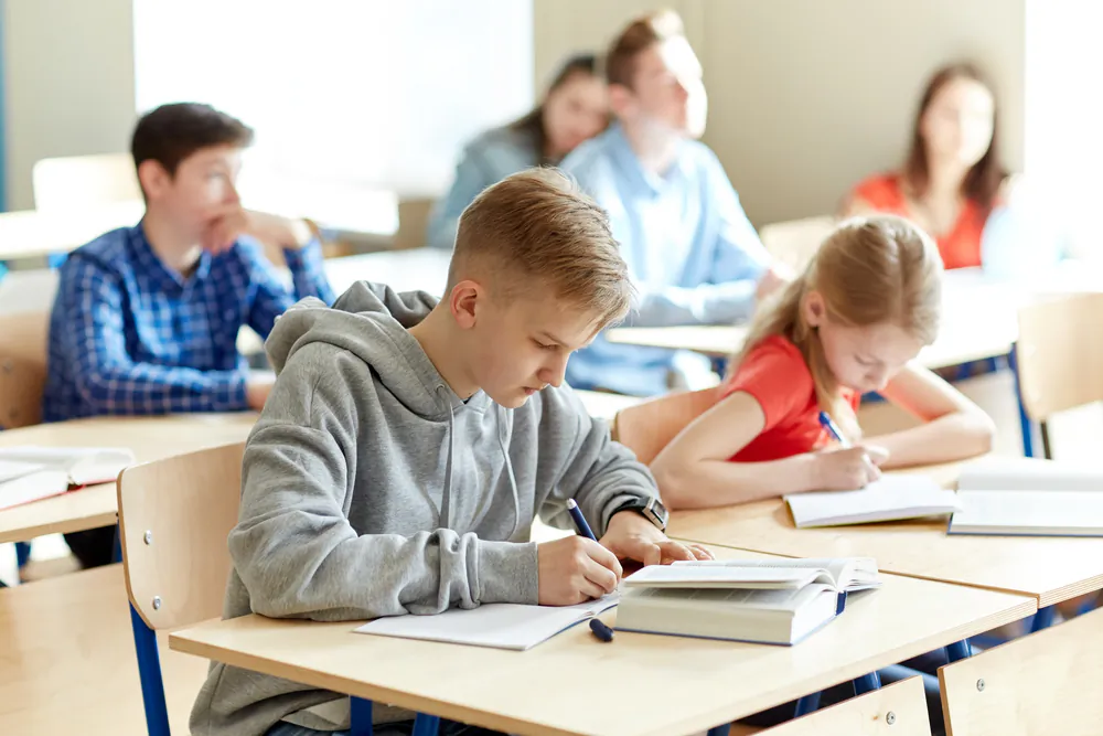 Under the current system, each child is bundled under one standardized umbrella. When considering the different types of learners, it is easy to see why some get left behind. (Shutterstock)
