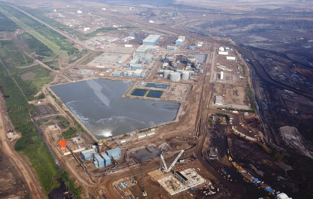 An oil sands facility seen from a helicopter near Fort McMurray, Alta., on July 10, 2012. (Jeff McIntosh/The Canadian Press)