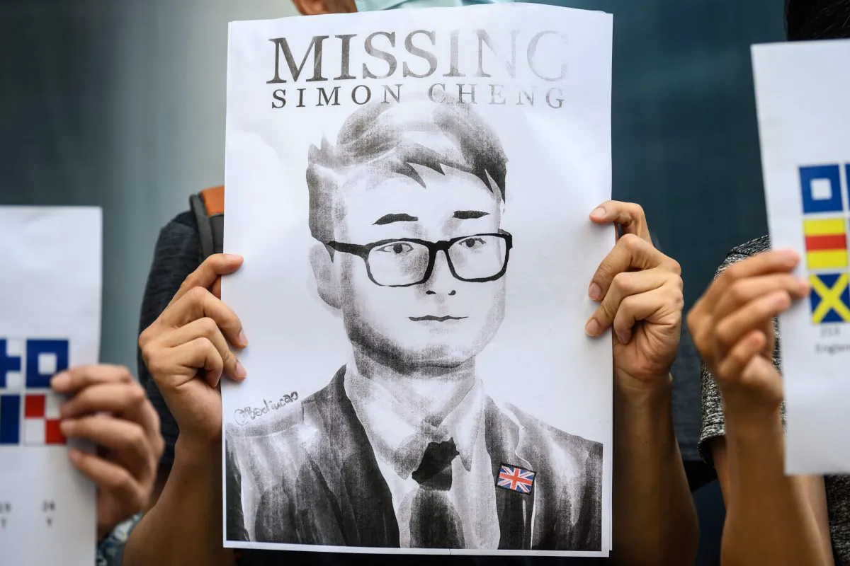 Activists gather outside the British Consulate-General building in Hong Kong on Aug. 21, 2019, following reports that Simon Cheng, a Hong Kong consulate employee, had been detained by mainland Chinese authorities on his way back to the city. (ANTHONY WALLACE/AFP/Getty Images)