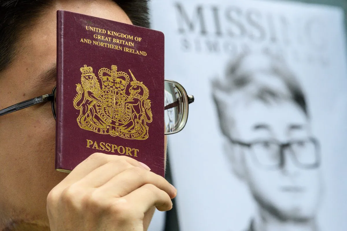 Activists gather outside the British Consulate-General building in Hong Kong on Aug. 21, 2019, following reports that Simon Cheng, a Hong Kong consulate employee, had been detained by mainland Chinese authorities on his way back to the city. (Anthony Wallace/AFP/Getty Images)