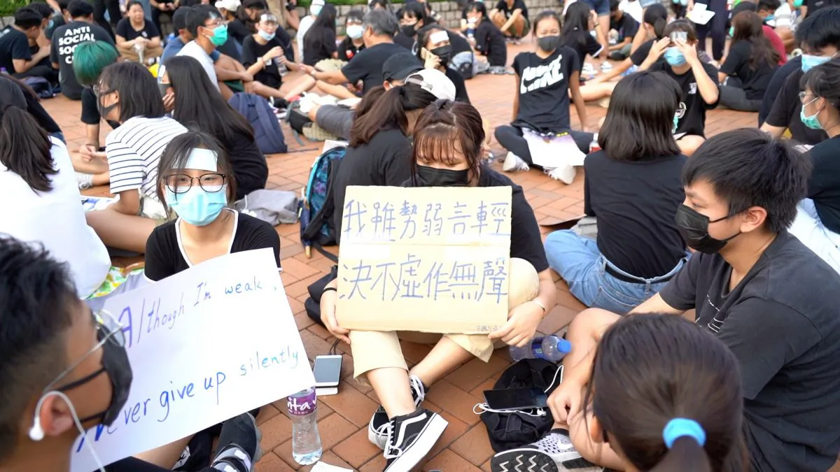 High school students attended a rally protesting the extradition bill and calling for international support in Hong Kong on Aug. 22, 2019. (Shenghua Sung/NTD News)