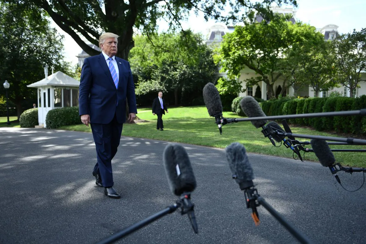 U.S. President Donald Trump walks to speak to the press at the White House as he departs for Bedminster on Aug. 2, 2019, on Washington, DC. (Brendan Smialowski/AFP/Getty Images)