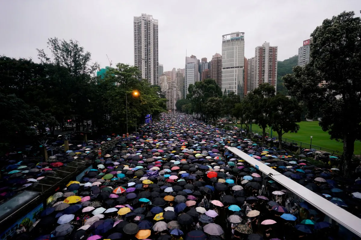 Anti-extradition bill protesters march to demand democracy and political reforms in Hong Kong, China on Aug. 18, 2019. (Aly Song/Reuters)