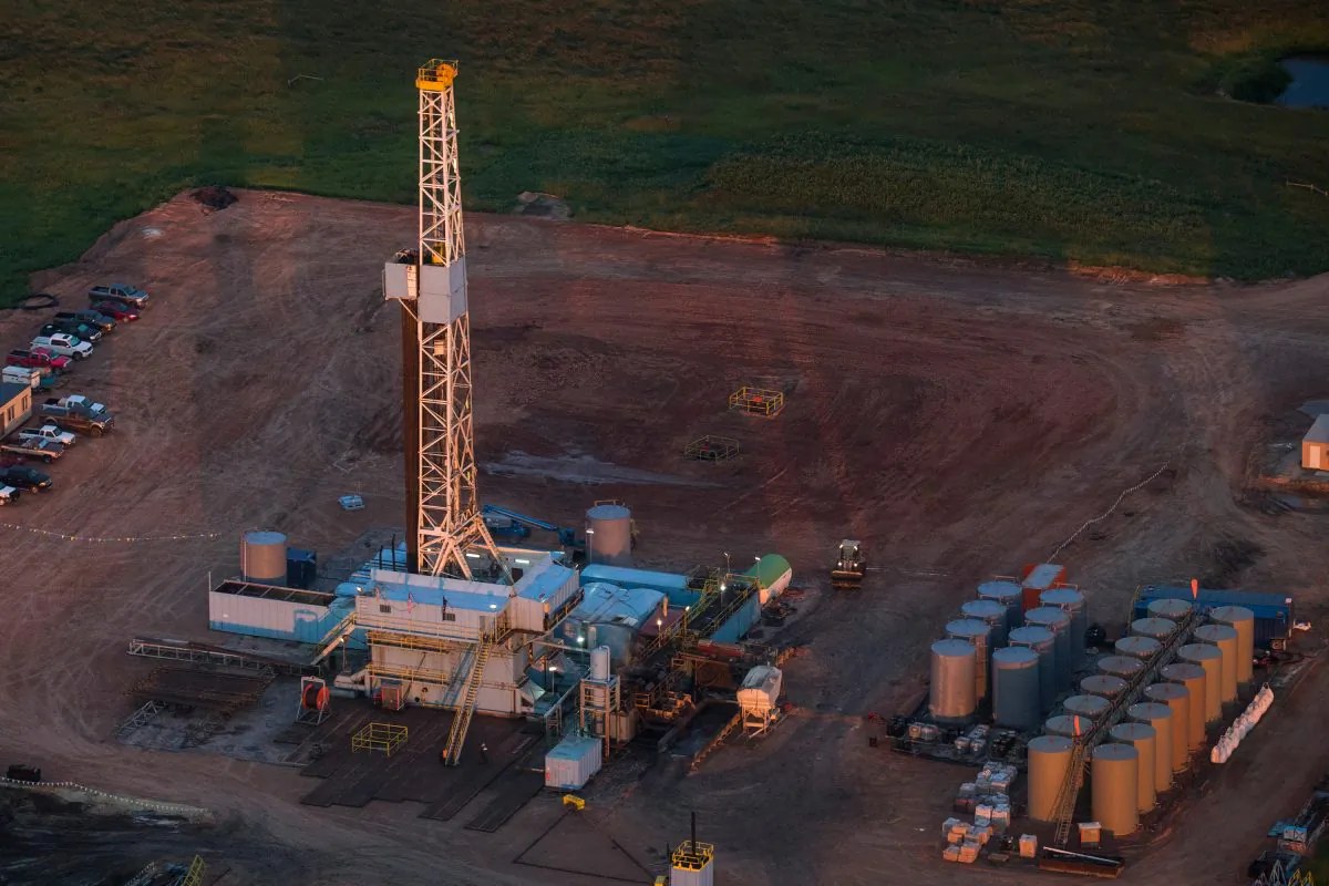 An oil drilling rig is seen in an aerial view near Watford City, N.D., in the early morning hours of July 30, 2013. (Andrew Burton/Getty Images)