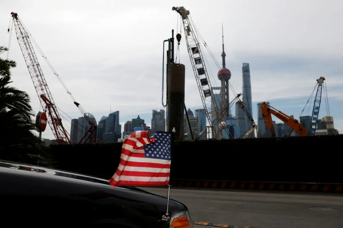 A U.S. flag on an embassy car is seen outside a hotel near a construction site in Shanghai, China on July 31, 2019. (Aly Song/Reuters)