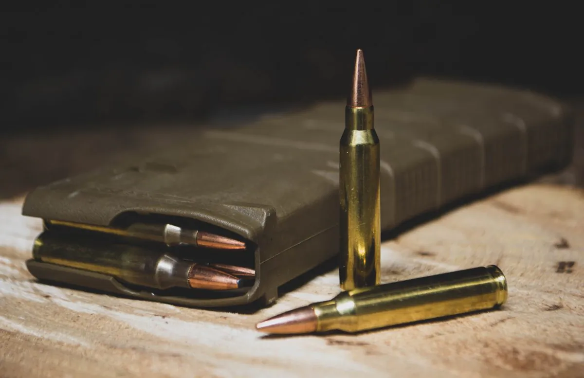 Stock photo of a magazine and ammunition. (Will Porada/Unsplash)