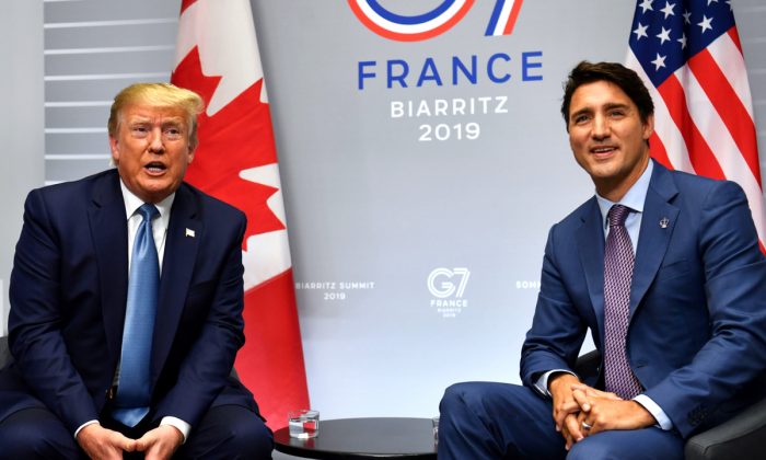 President Donald Trump (L) and Canada's Prime Minister Justin Trudeau pose as they take part in a bilateral meeting at the Bellevue centre in Biarritz, south-west France on the second day of the annual G7 Summit attended by the leaders of the world's seven richest democracies, Britain, Canada, France, Germany, Italy, Japan and the United States on Aug. 25, 2019. (Nicholas Kamm/AFP/Getty Images)
