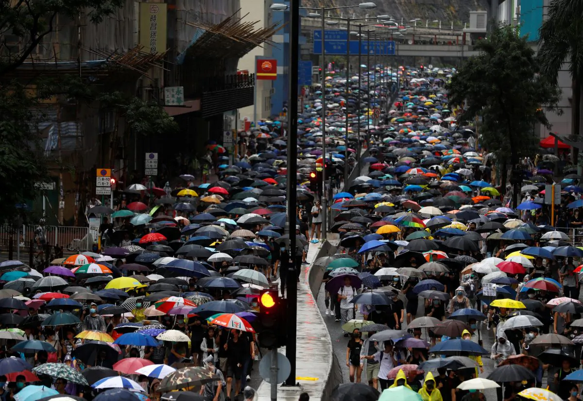 People march during a protest in Kwai Fong, in Hong Kong, on Aug. 25, 2019. (Kai Pfaffenbach/Reuters)