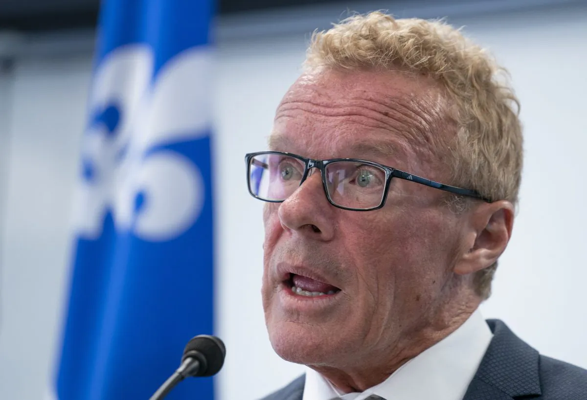 Quebec Labour Minister Jean Boulet responds to a question during a news conference in Montreal on Aug. 26, 2019. (Paul Chiasson/The Canadian Press)