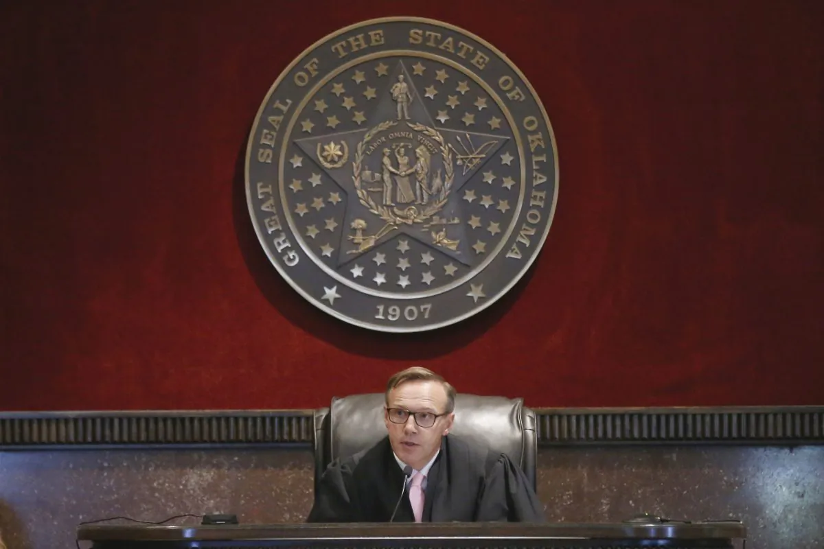 Judge Thad Balkman announces his decision in the Opioid Lawsuit In Norman, Okla., Aug. 26, 2019. Balkman found Johnson & Johnson and its subsidiaries helped fuel the state's opioid drug crisis and ordered the consumer products giant to pay $572 million to help abate the problem in the coming years. (Sue Ogrocki/AP)