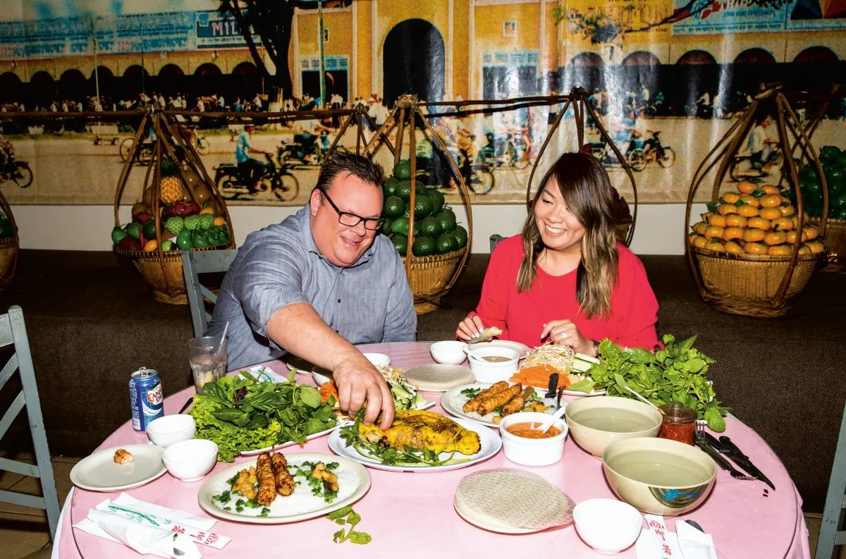 Chris Shepherd (L) with friend, mentor, and talented chef Jacklyn Pham, who runs the Vietnamese restaurant Saigon Pagolac with her father, Long. (Julie Soefer)