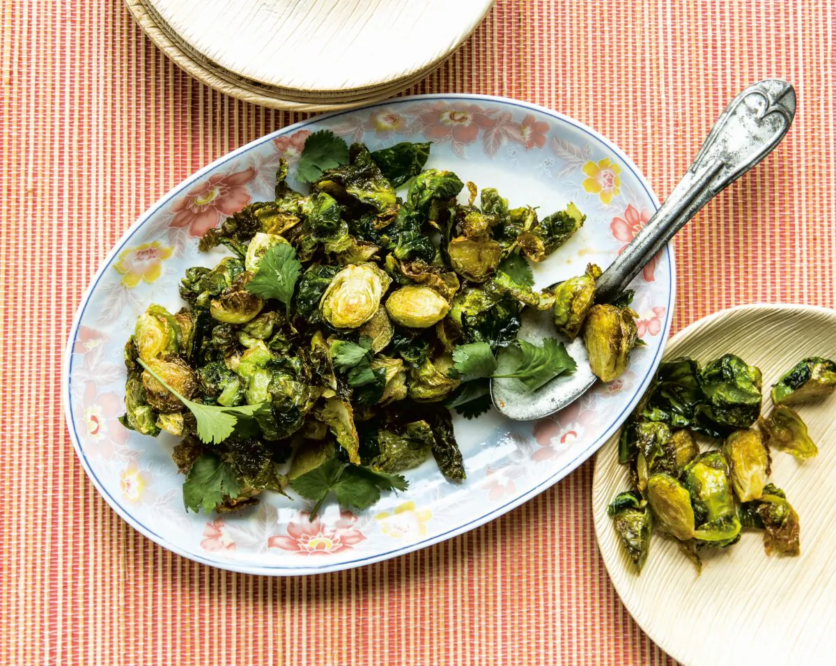Shepherd's recipes, like these fish sauce caramel Brussels sprouts, reflect his multicultural inspirations. (Julie Soefer)