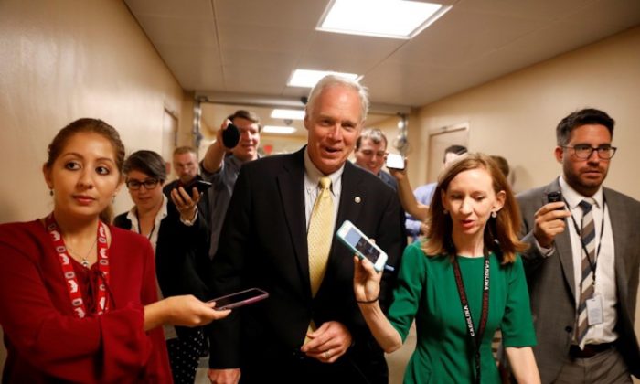 Sen. Ron Johnson (R-Wis.) speaks with reporters ahead of today's vote on the health care bill on Capitol Hill in Washington on July 25, 2017. (Aaron P. Bernstein/Reuters)