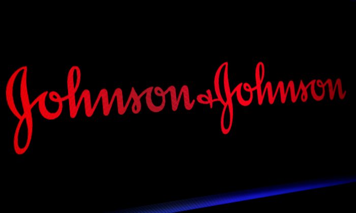 The Johnson & Johnson logo is displayed on a screen on the floor of the New York Stock Exchange (NYSE) in New York, on May 29, 2019. (Brendan McDermid/Reuters)