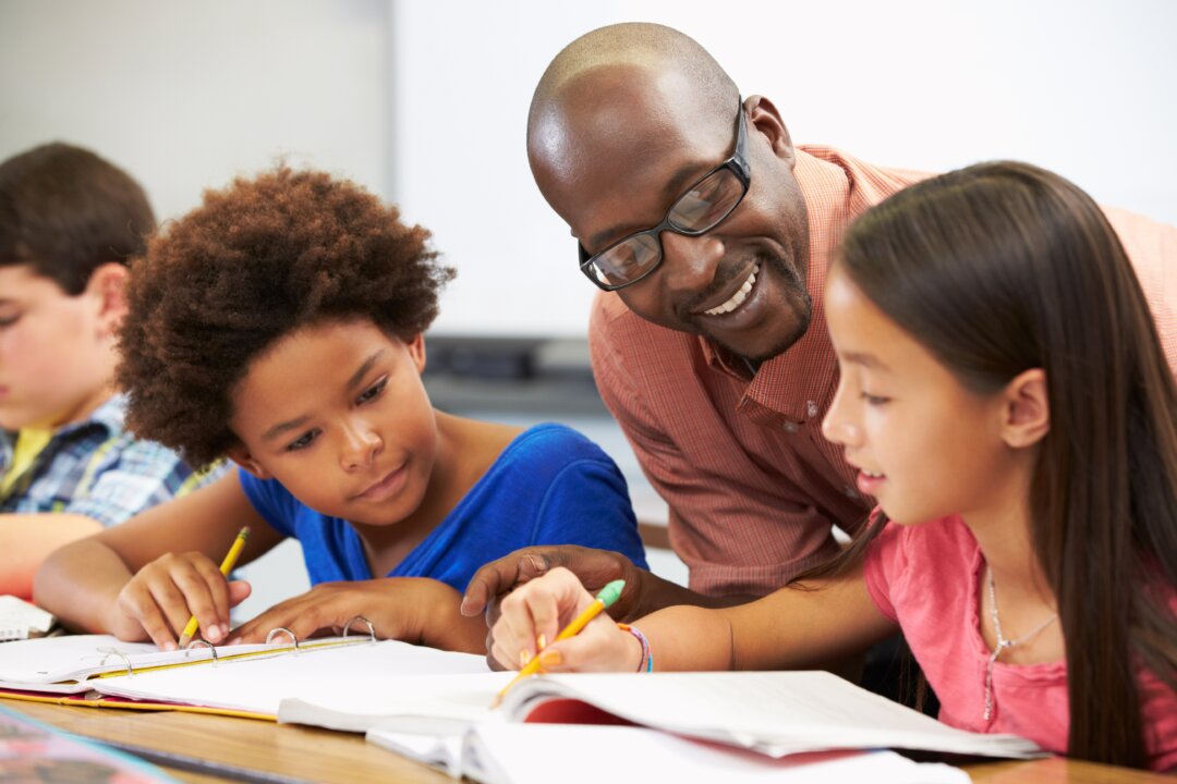 Some highly paid professionals leave jobs for jobs they feel are more meaningful, like being a teacher. (Monkey Business Images/Shutterstock)