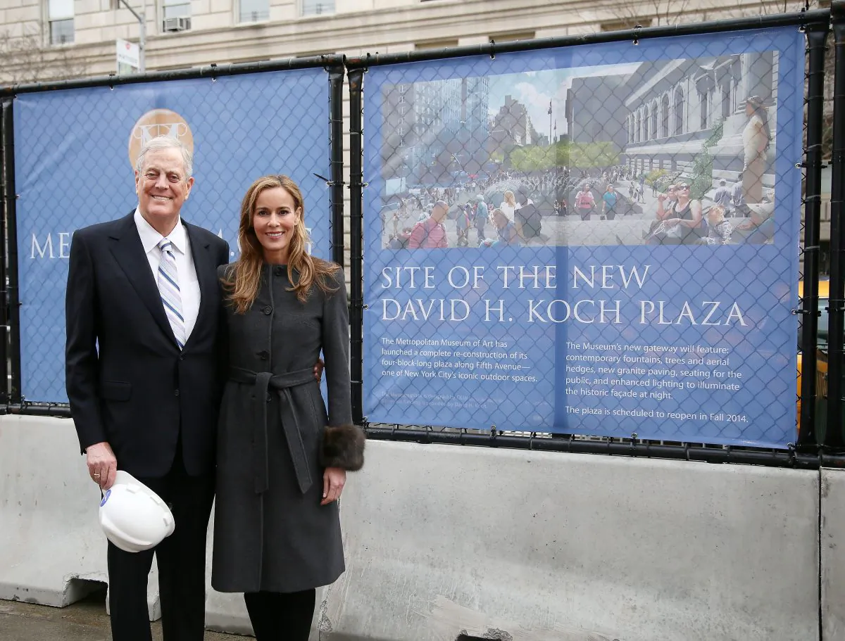 Philanthropist David H. Koch and wife Julia Koch stand in the future site of the new David H. Koch Plaza during the Fifth Avenue Plaza Groundbreaking at the Metropolitan Museum of Art on January 14, 2013 in New York City.  (Astrid Stawiarz/Getty Images)