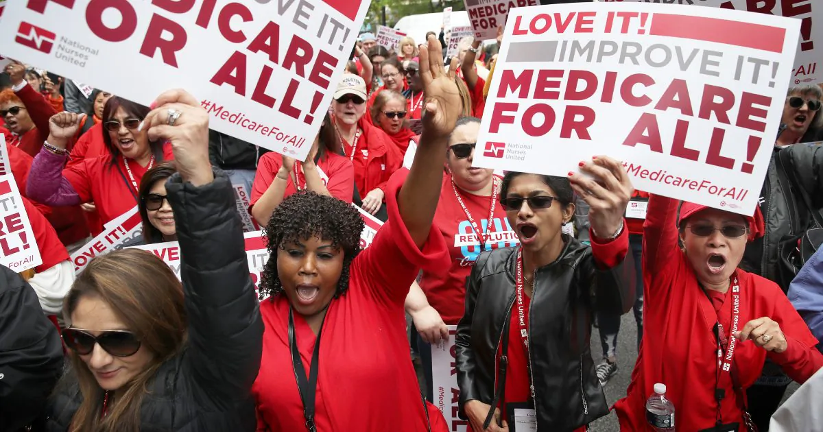 Protesters supporting “Medicare for All” hold a rally outside PhRMA headquarters in Washington, DC. on April 29, 2019. (Win McNamee/Getty Images)