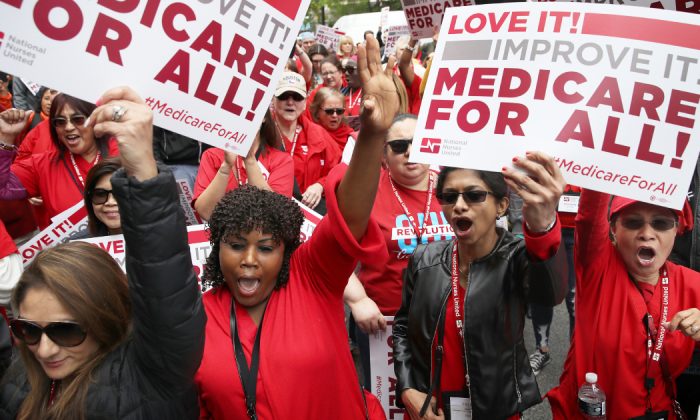 Protesters supporting âMedicare for Allâ hold a rally outside PhRMA headquarters in Washington, DC. on April 29, 2019. (Win McNamee/Getty Images)