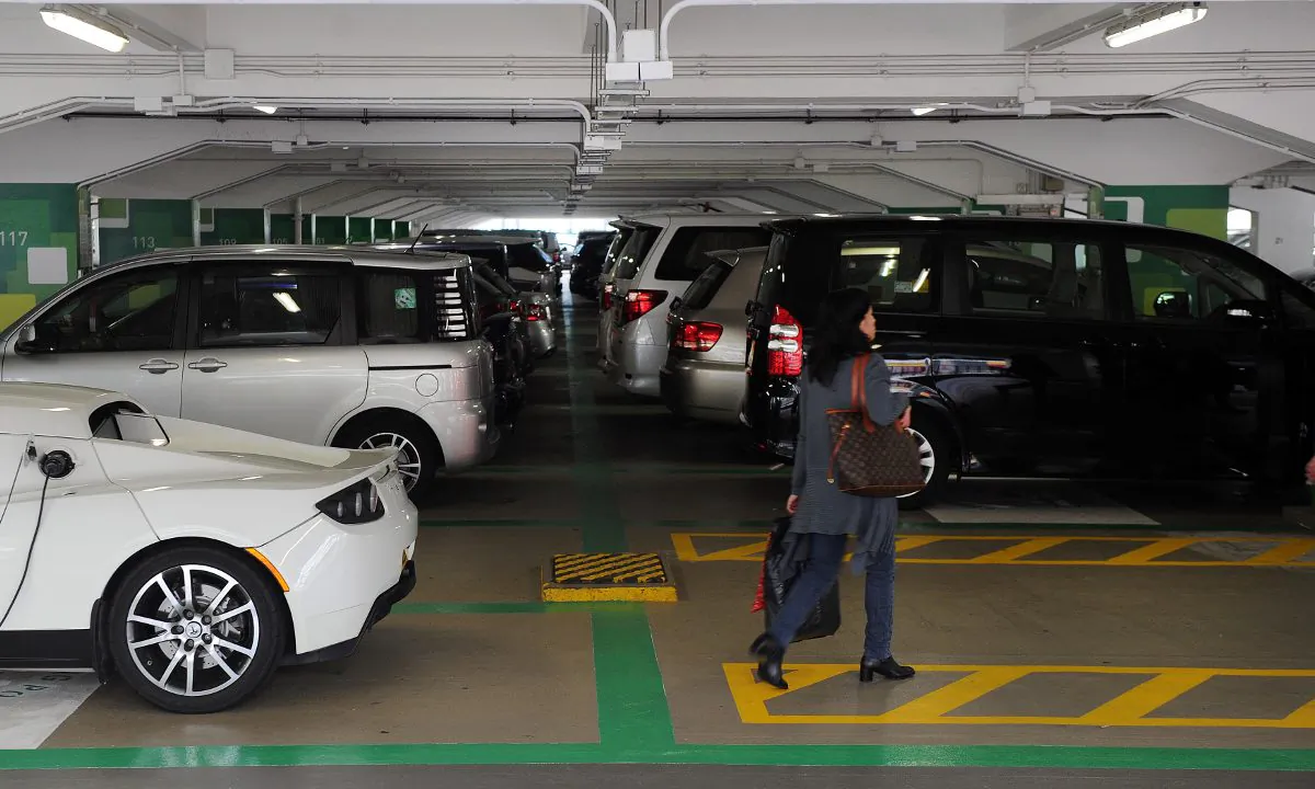 A woman in a parking garage in China in this file photo. (Laurent Fievet/AFP/Getty Images)