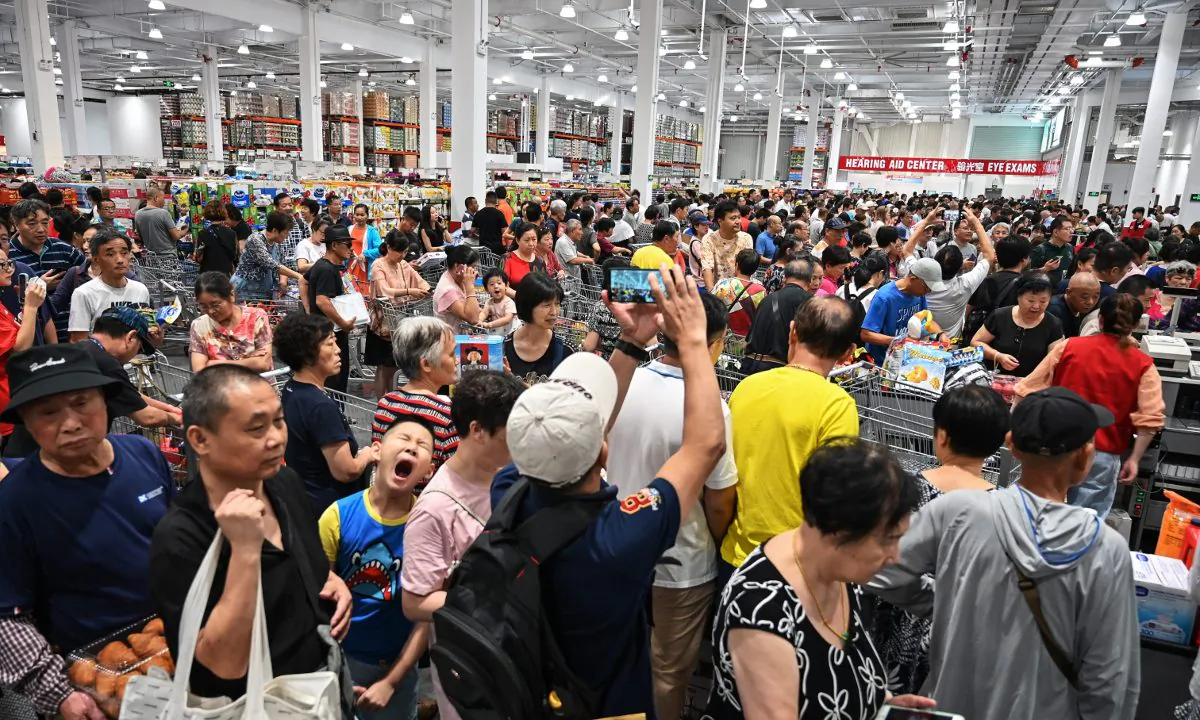 People visit the first Costco outlet in China, on the store's opening day in Shanghai on Aug. 27, 2019. (Hector Retamal/AFP/Getty Images)