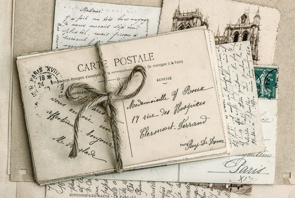 Old family letters in cursive handwriting. (Shutterstock)